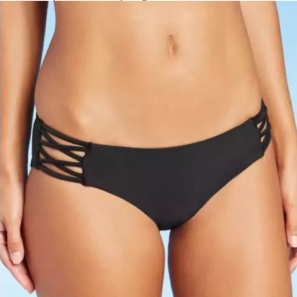 Black cheeky strappy bikini bottoms.